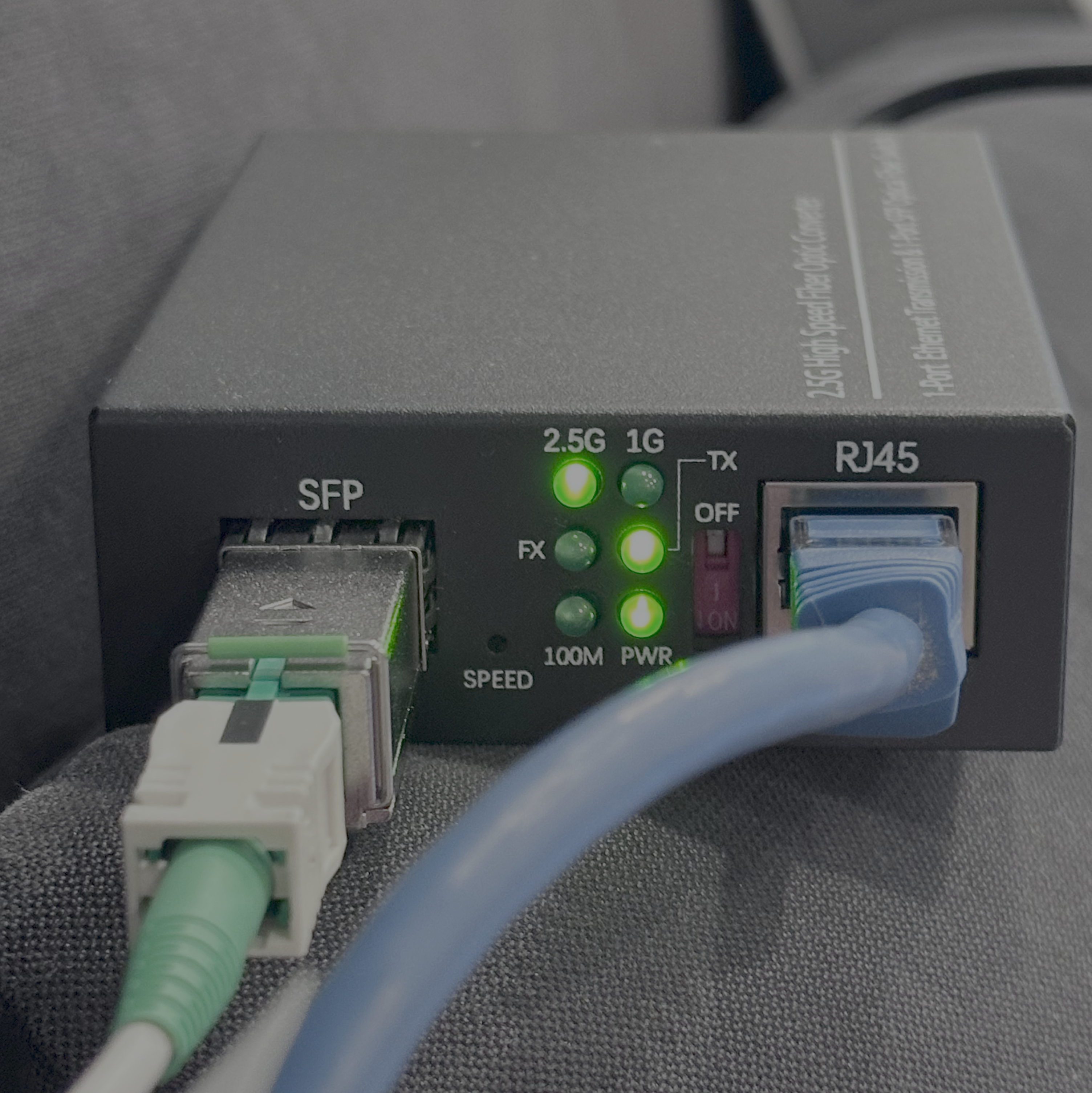 The 2.5G media converter I bought off Amazon. Counter-intuitively, you want the little switch set to 'off'!